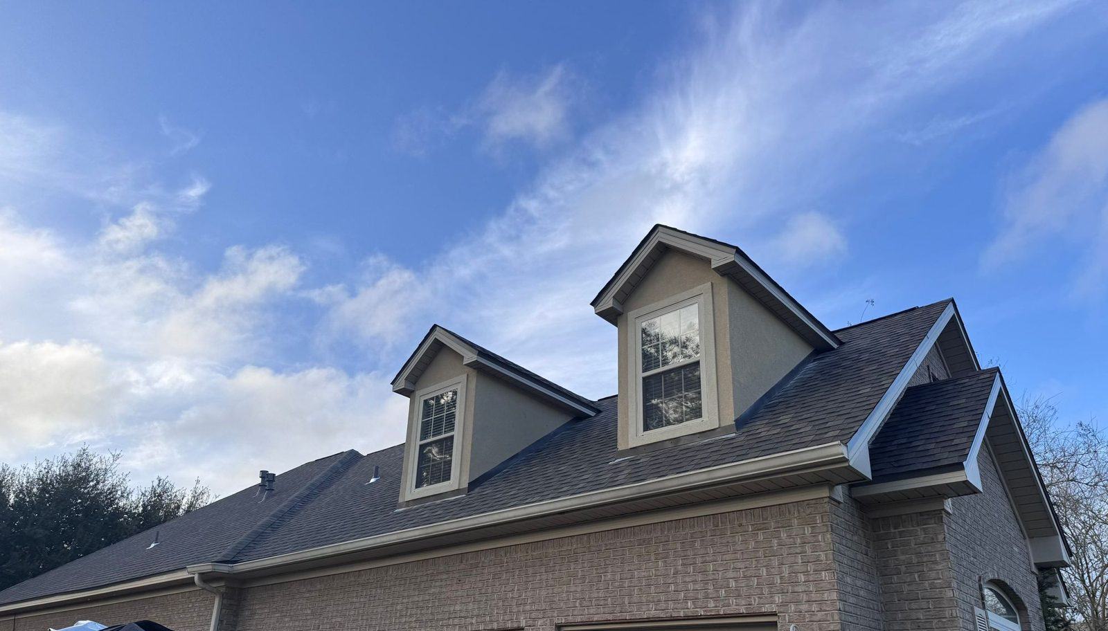 New FORTIFIED shingle roof with two dormers on a brick home in Foley