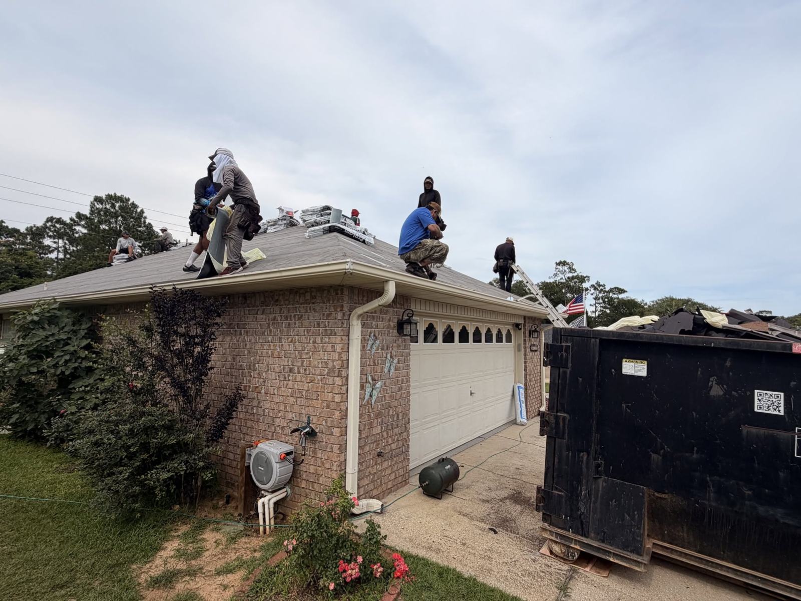 Bowab crew working on a roof in Baldwin County