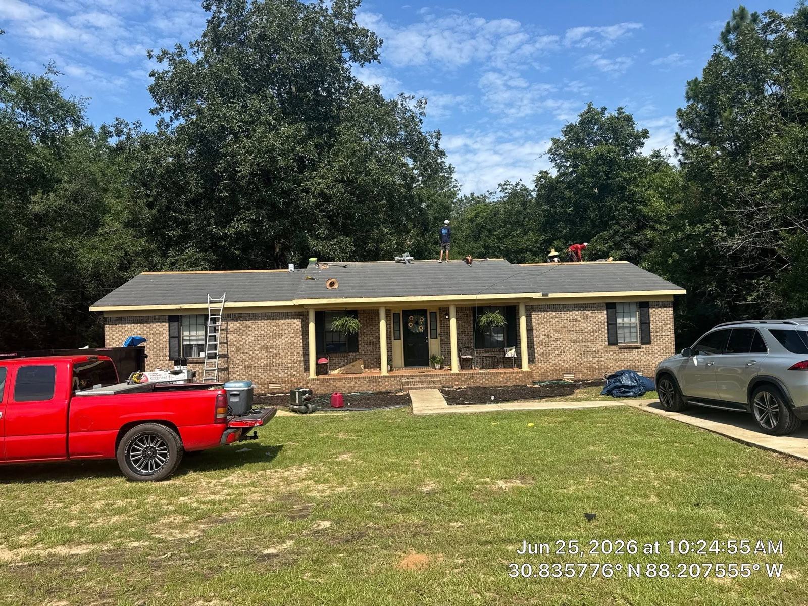 Completed roof replacement on a brick ranch home