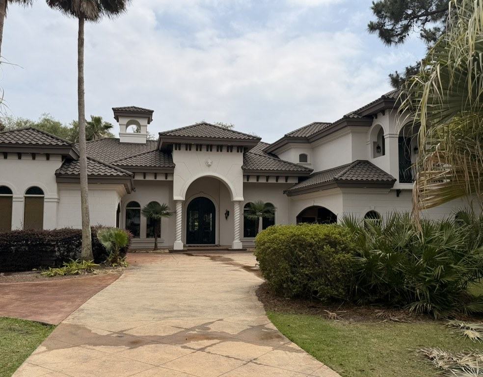 DECRA stone-coated steel tile roof installed by Bowab on a Mediterranean-style home
