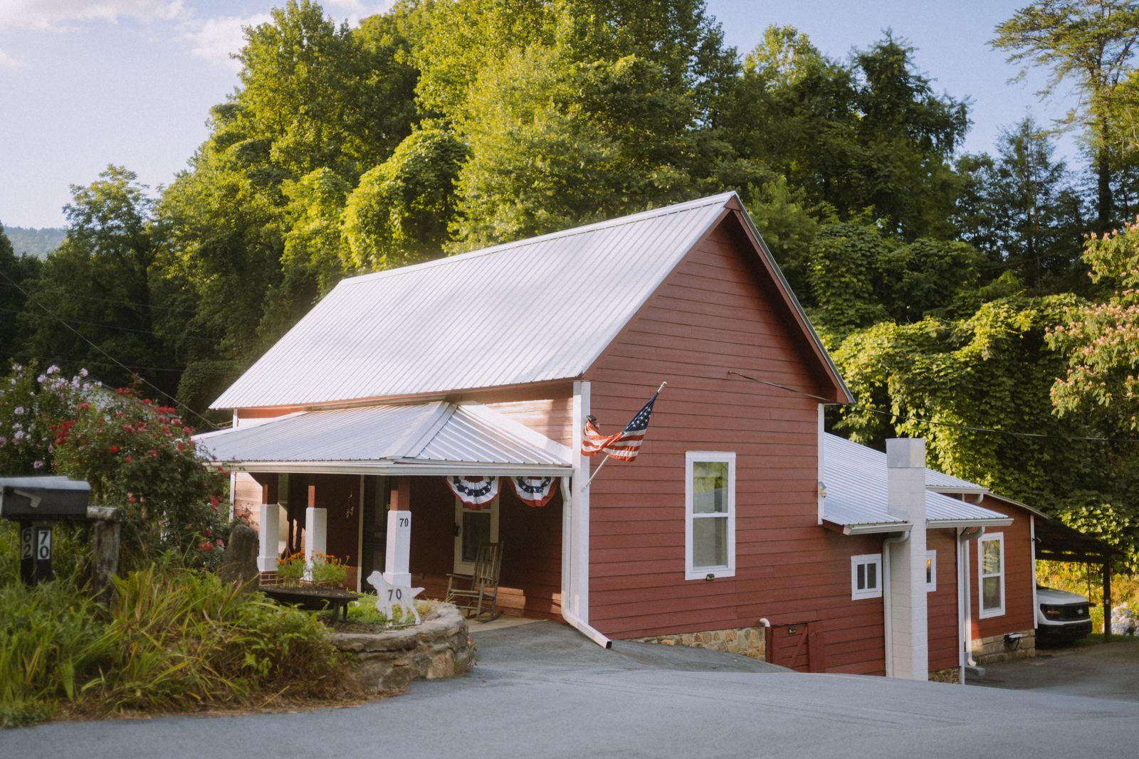Farmhouse with a ribbed exposed fastener metal roof