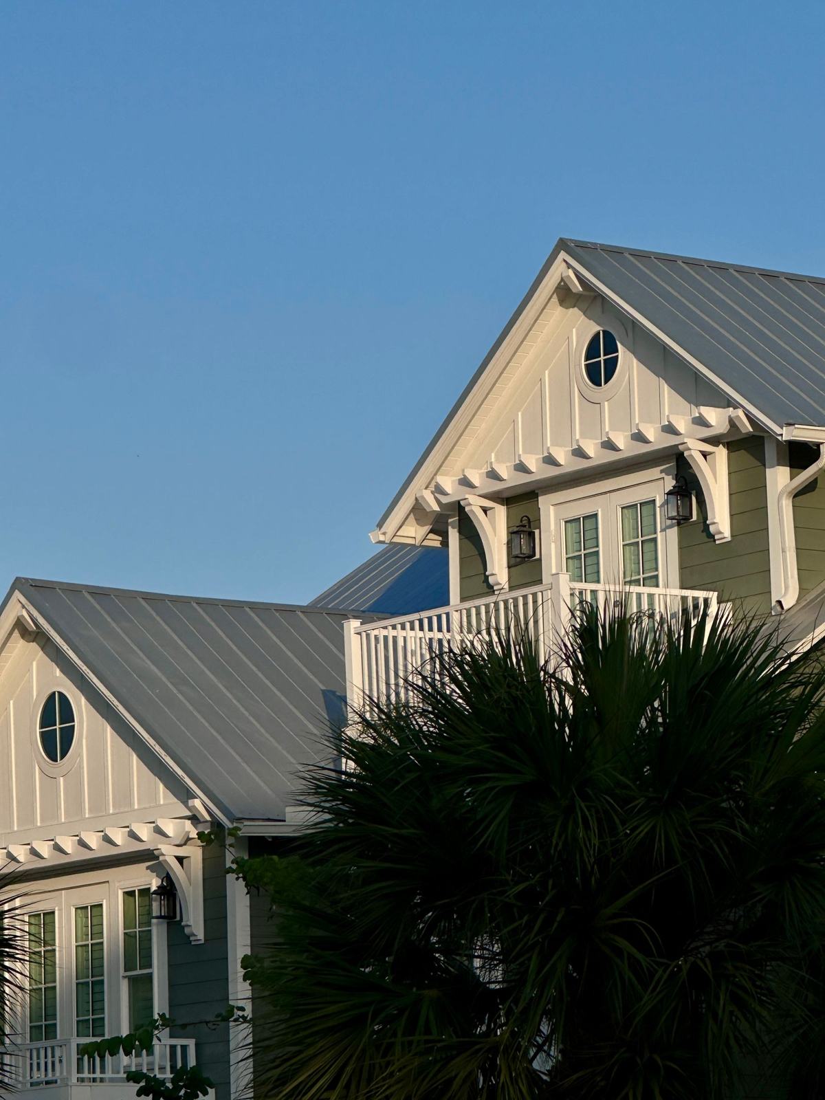 Standing seam metal roof on a two-story coastal home