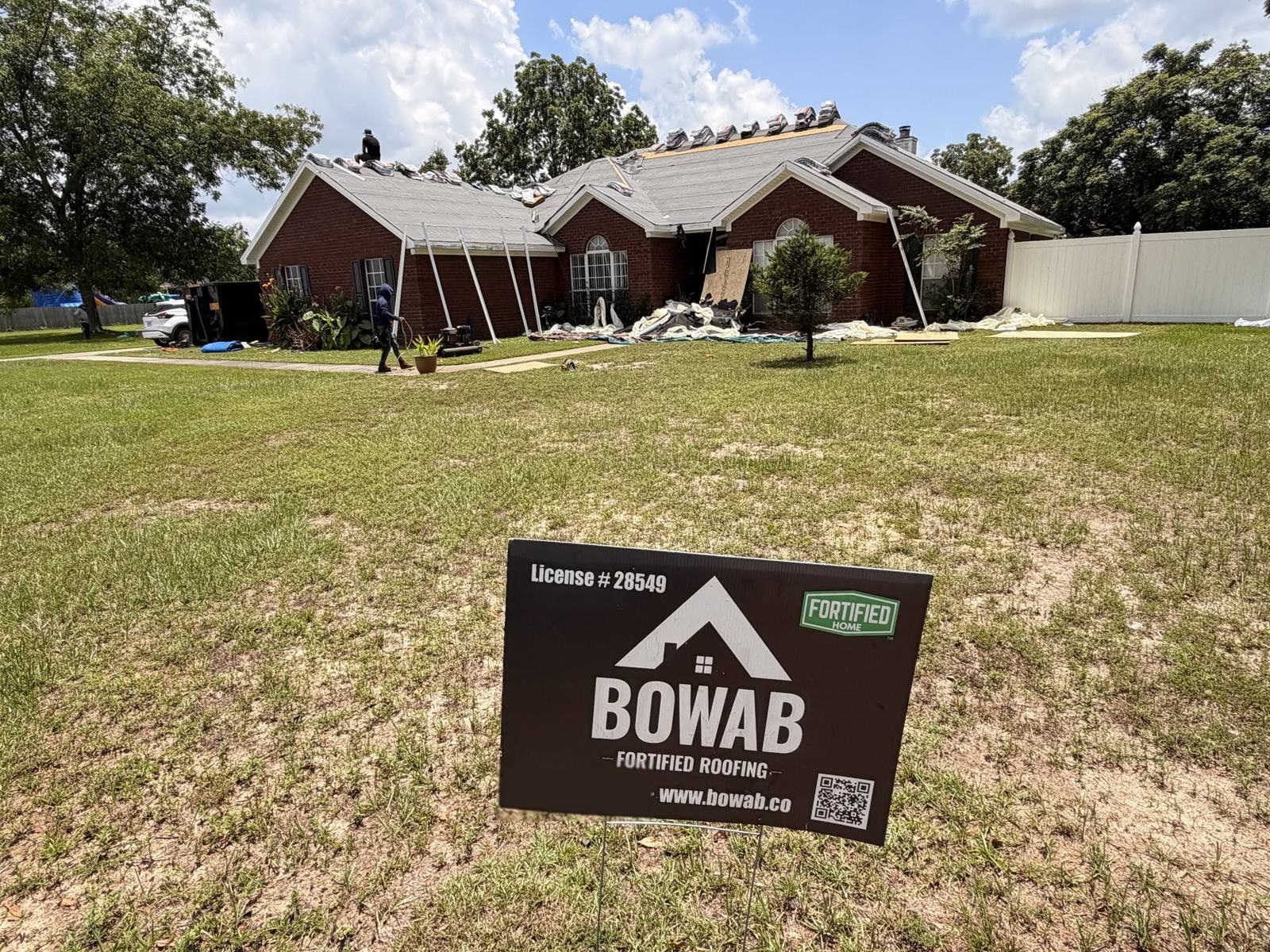 Bowab Fortified Roofing yard sign at a completed Strengthen Alabama Homes grant job